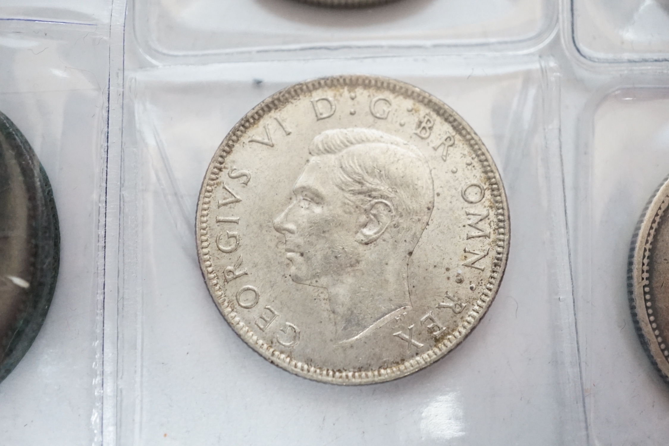 UK coins, 1938 and 1942 half crowns, 1736 farthing, 1806 penny, 1942 and a ZuidAfrica 2 shillings